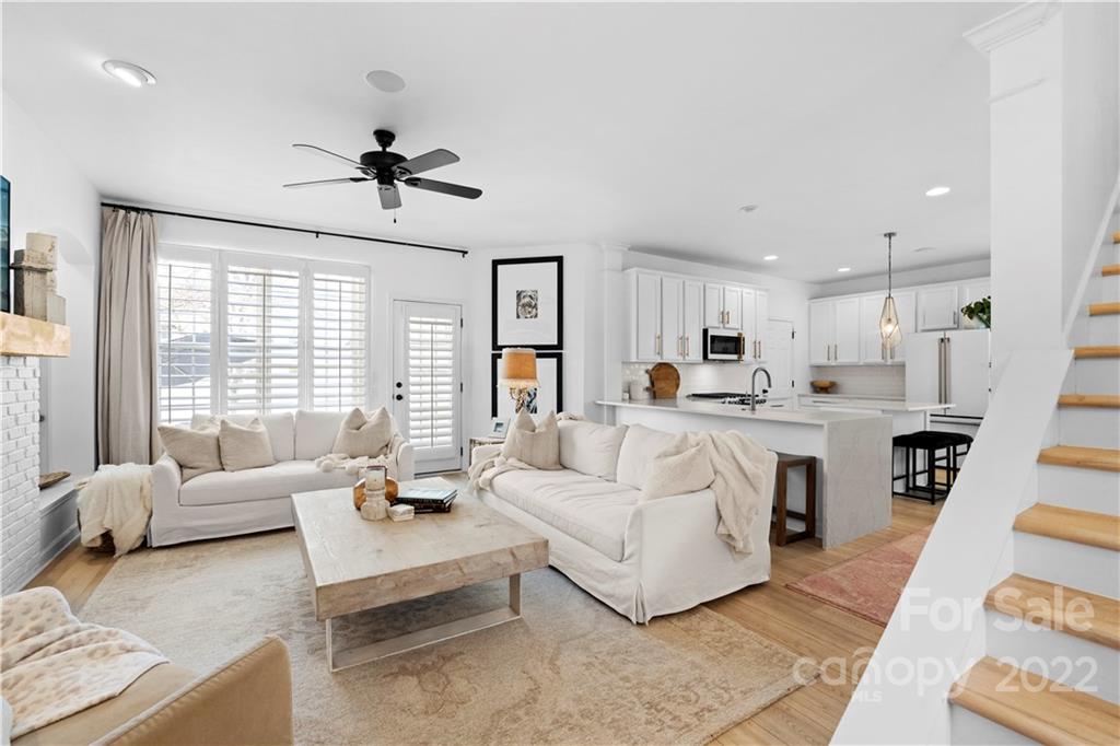 8106 Evanston Falls Road Huntersville, NC 28078 - Photo 2 of 36 a living room with furniture and a large window