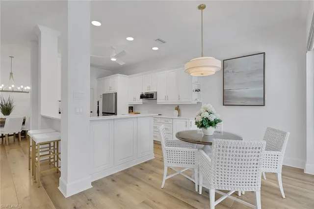 a kitchen with a sink a stove and refrigerator