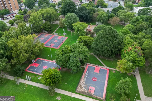an outdoor space with lots of trees