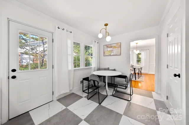 a view of a livingroom with furniture and window