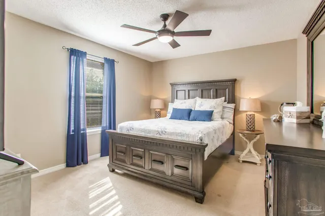 a bedroom with a bed and a view of bathroom