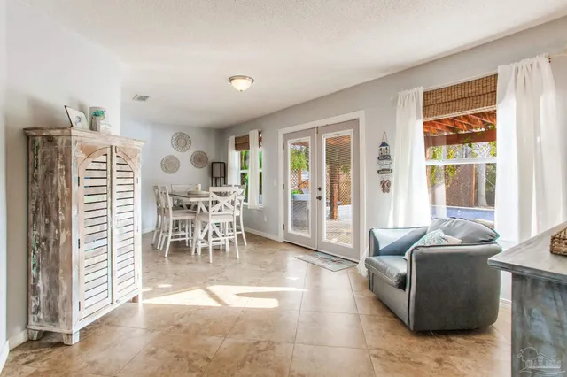 a outdoor living space with furniture and a potted plant