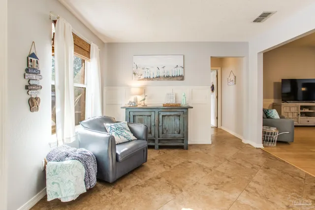 a view of a swimming pool with a patio