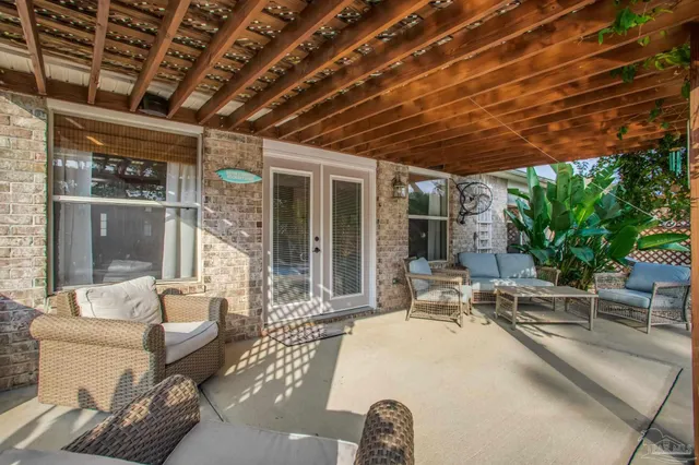 a view of a house with a yard and swimming pool