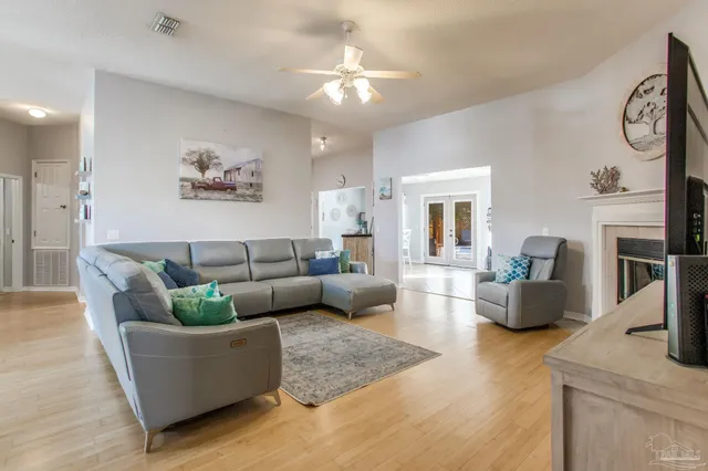 a living room with furniture and a couch