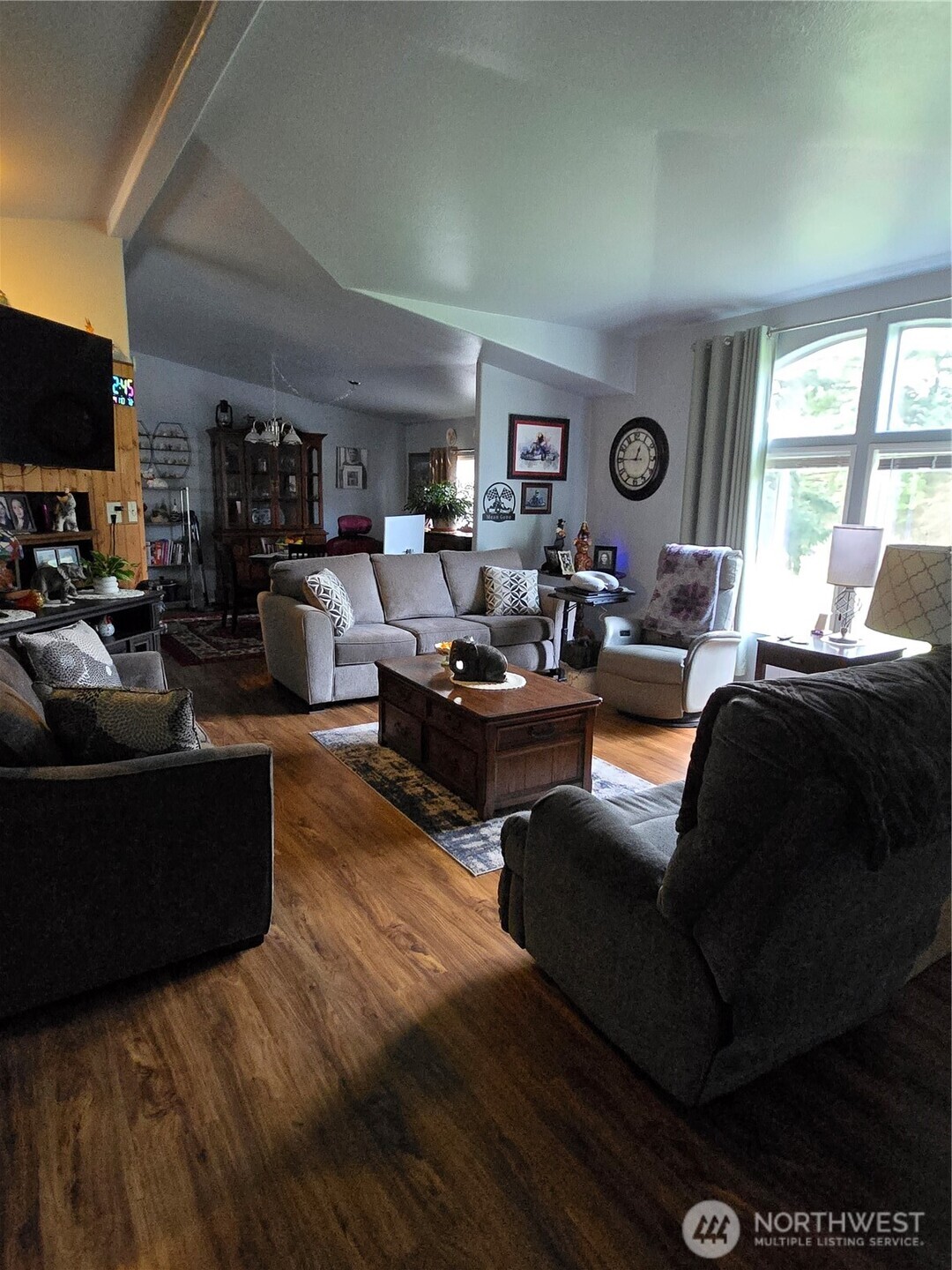 1466 Ferrier Road Winlock, WA 98596 - Photo 11 of 33 a living room with furniture fireplace and a large window