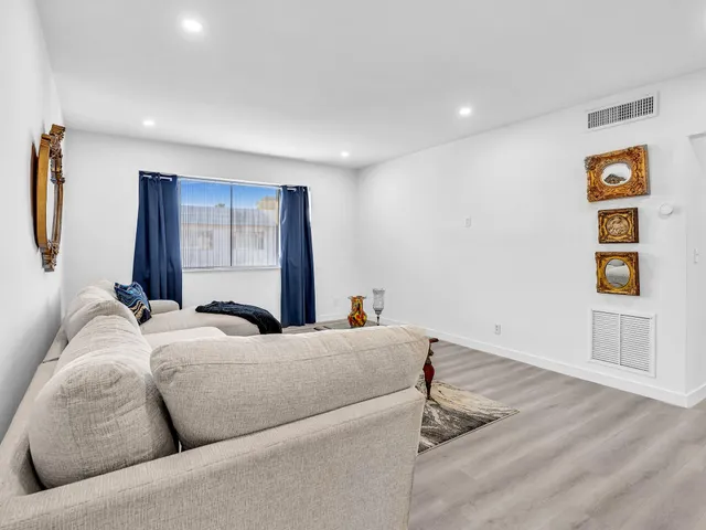 a bedroom with furniture and a bed