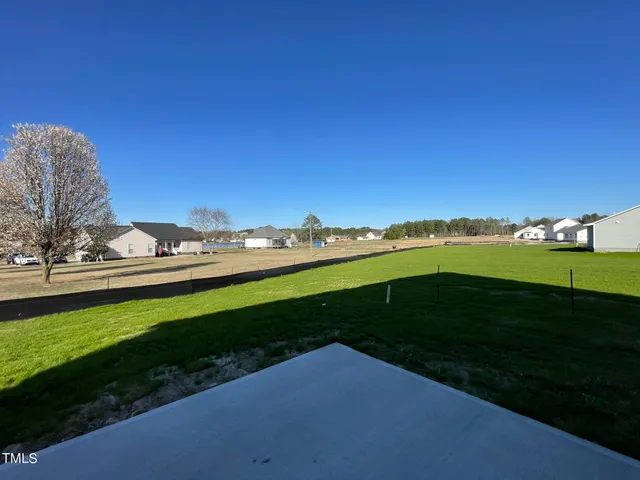 a view of an outdoor space and a yard
