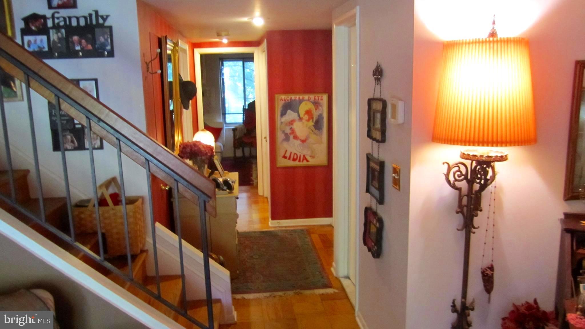 110 Cross Keys Road, Unit R110F Baltimore, MD 21210 - Photo 2 of 30 a view of an entryway with wooden floor