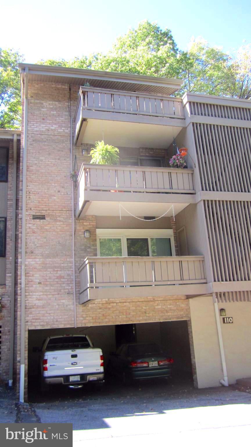 110 Cross Keys Road, Unit R110F Baltimore, MD 21210 - Photo 23 of 30 a view of balcony with furniture