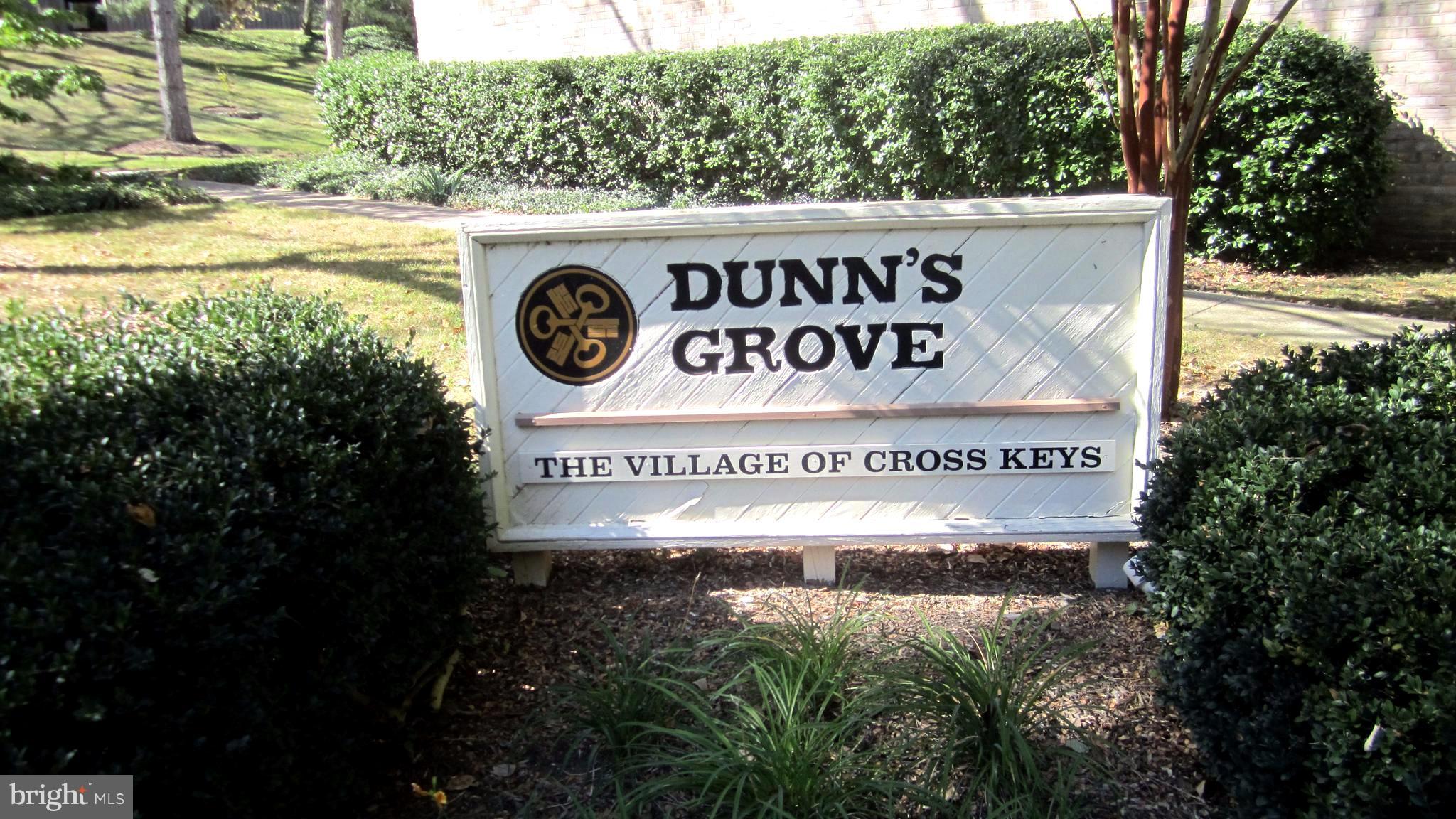 110 Cross Keys Road, Unit R110F Baltimore, MD 21210 - Photo 24 of 30 a sign that is on the side of the street