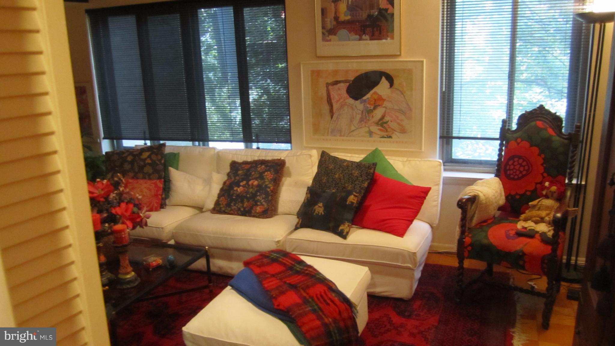 110 Cross Keys Road, Unit R110F Baltimore, MD 21210 - Photo 6 of 30 a view of a living room and a couch