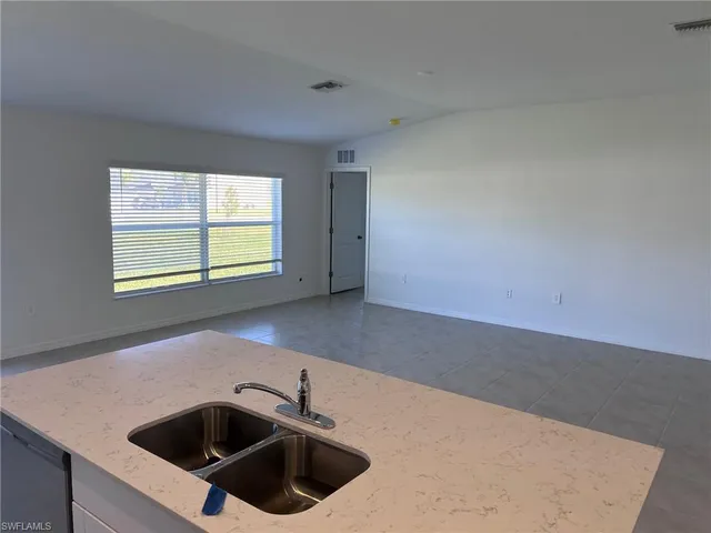 a house view with a garden space