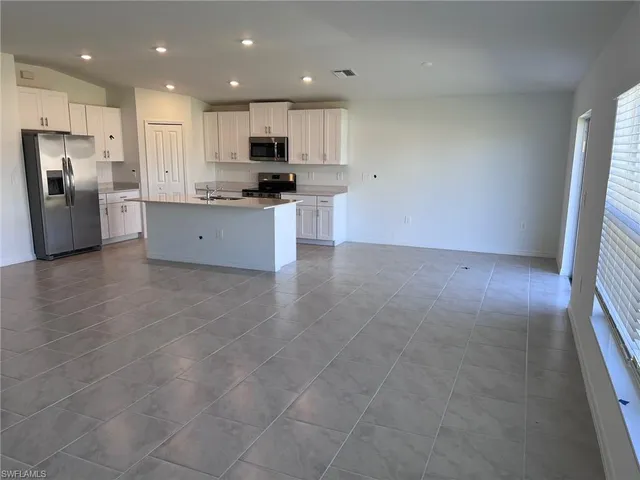 a house view with a backyard space