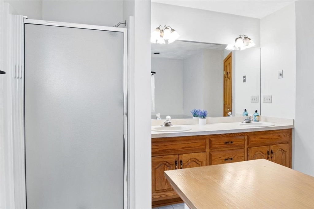 72 Jefferson Road Franklin, MA 02038 - Photo 20 of 33 a spacious bathroom with a bathtub and a sink