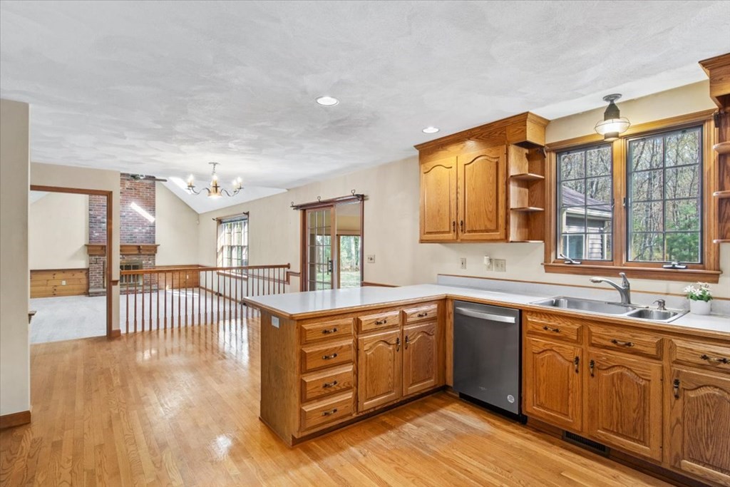 72 Jefferson Road Franklin, MA 02038 - Photo 2 of 33 a kitchen with a sink cabinets and wooden floor
