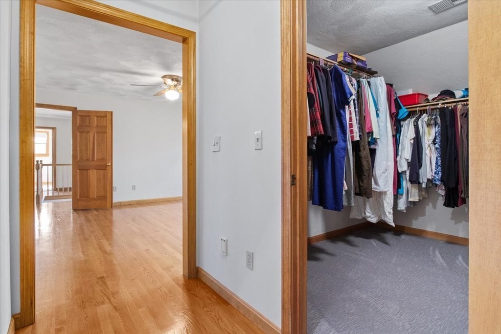 72 Jefferson Road Franklin, MA 02038 - Photo 21 of 33 a view of walk in closet with clothes