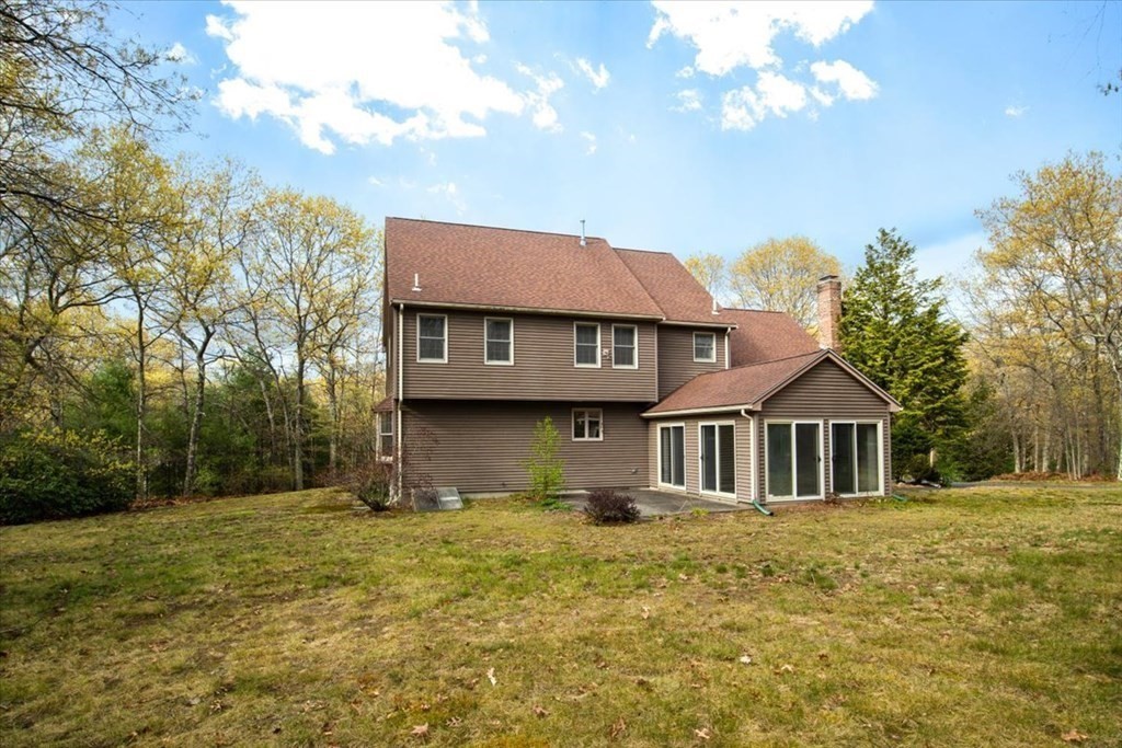 72 Jefferson Road Franklin, MA 02038 - Photo 29 of 33 a front view of a house with a garden