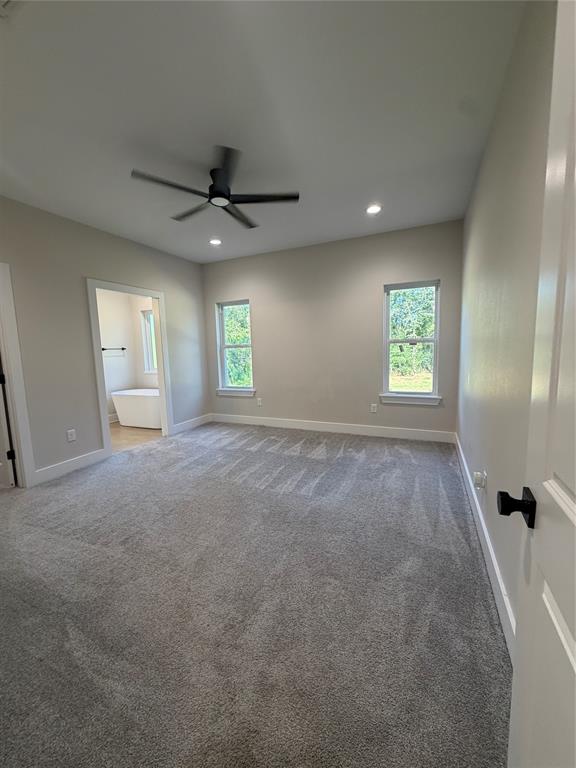 304 Lake Road Plain Dealing, LA 71064 - Photo 12 of 16 a view of an empty room with a window