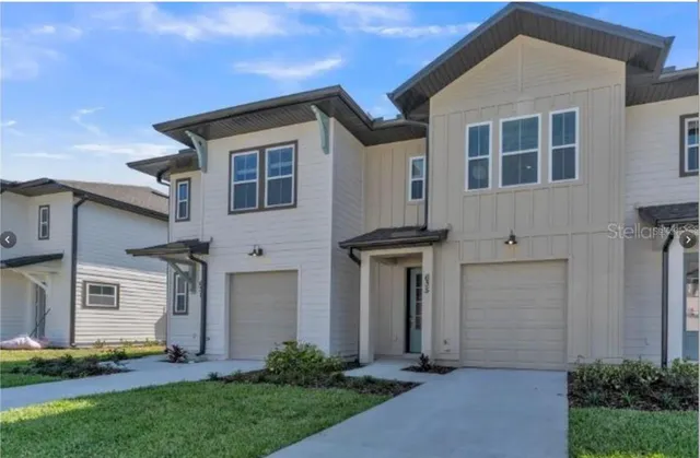 a front view of house with yard