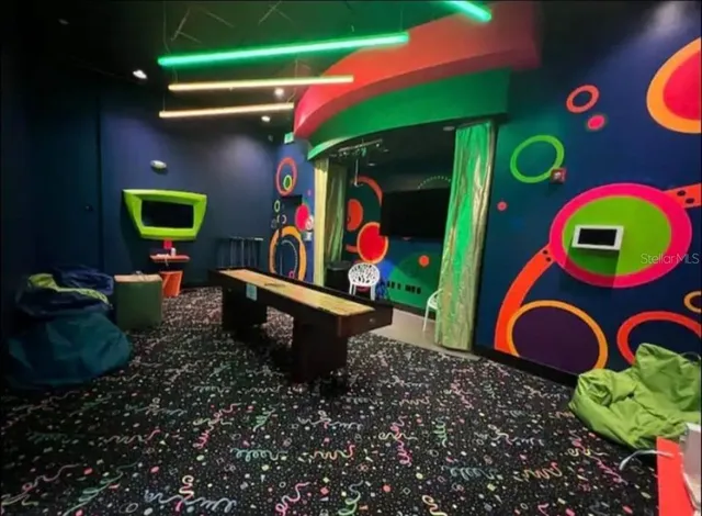 a view of swimming pool outdoor seating