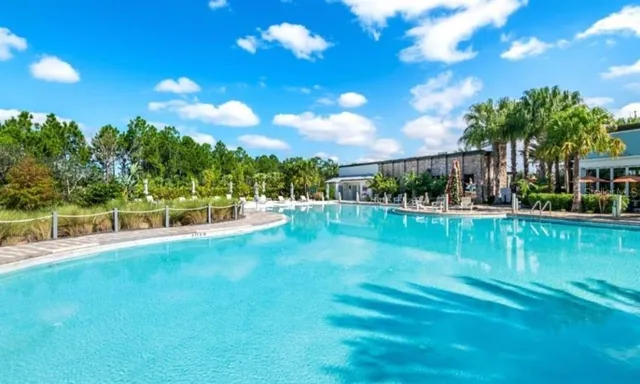 a view of a golf course with a swimming pool