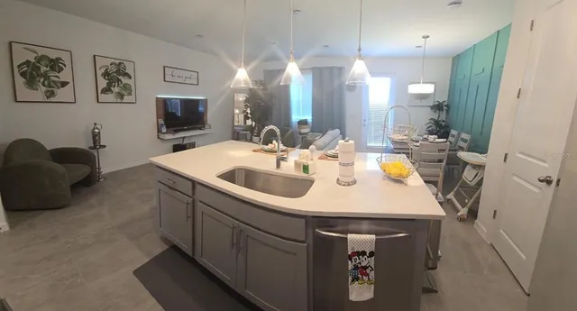 a bathroom with a sink a vanity and a mirror