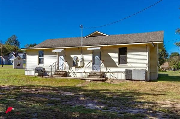 a view of a house with a swimming pool