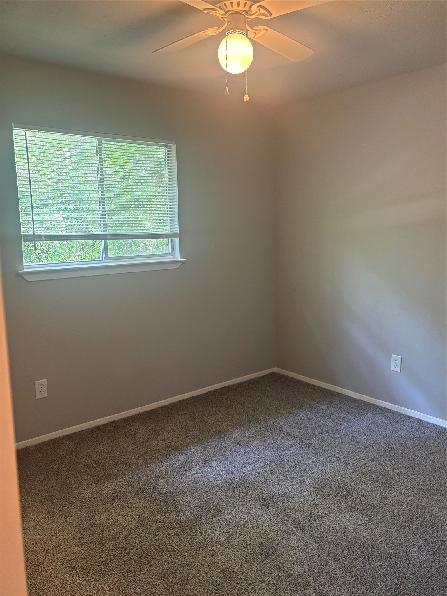 73 South Waxberry Road The Woodlands, TX 77381 - Photo 12 of 23 an empty room with a window