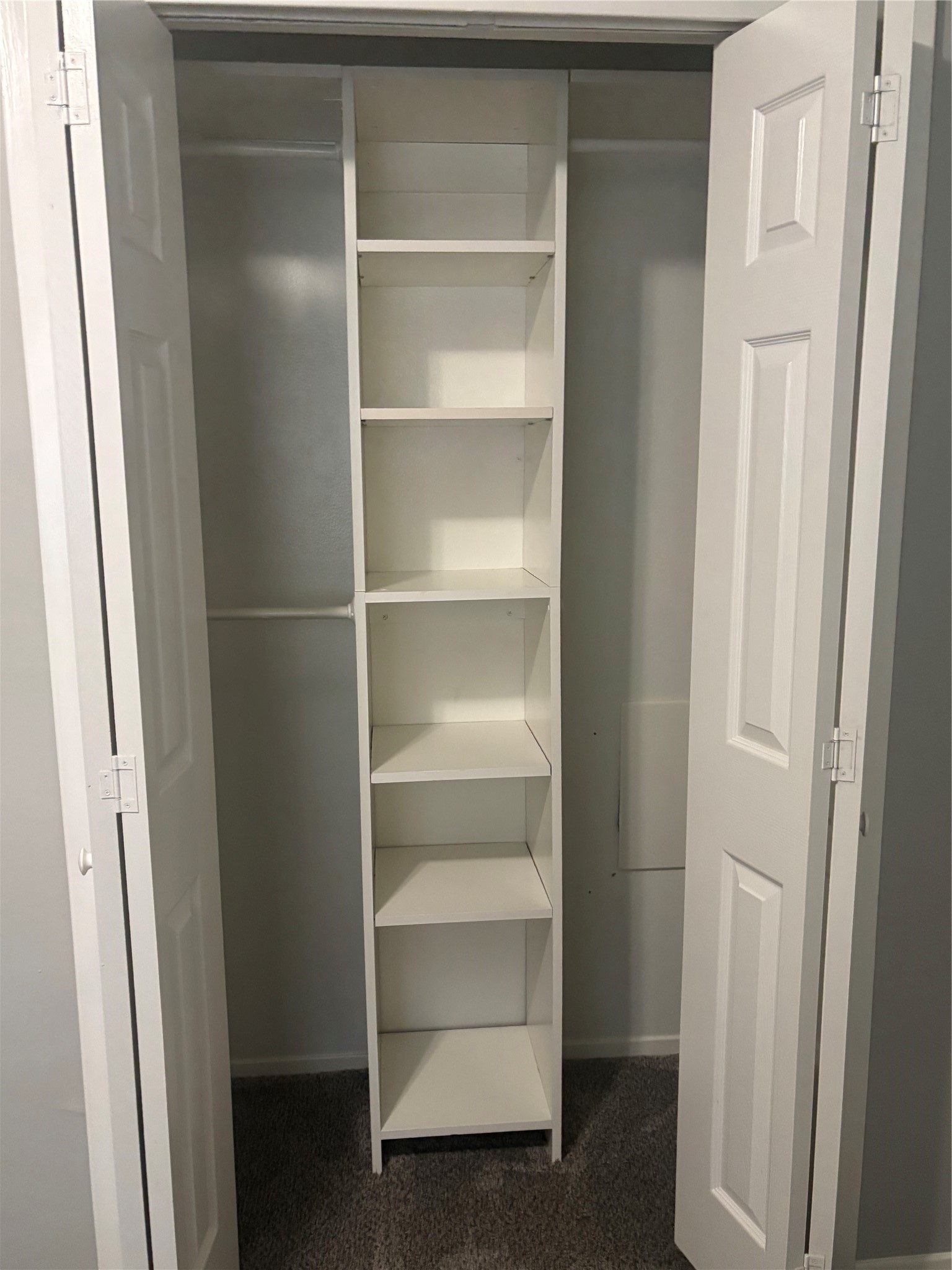 73 South Waxberry Road The Woodlands, TX 77381 - Photo 14 of 23 a view of walk in closet with empty racks