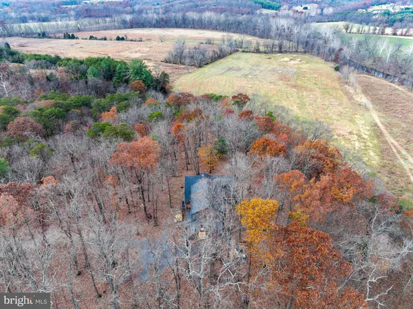 a kitchen with stainless steel appliances a sink and a refrigerator