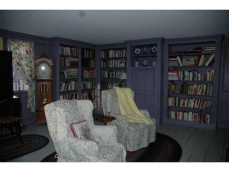 144 Ferry Road Saco, ME 04072 - Photo 19 of 34 Living Room. library corner of the...