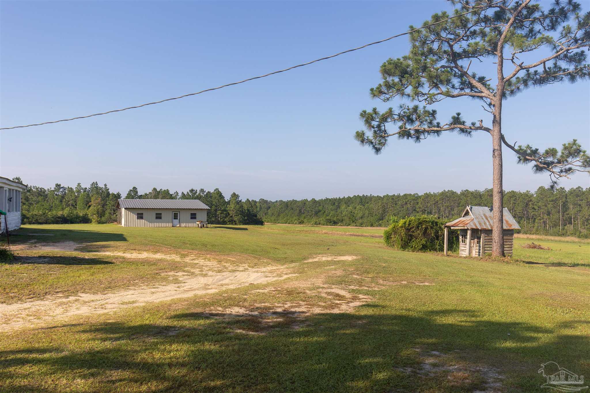 19755 Vaughn Road Seminole, AL 36574 - Photo 2 of 45 a view of a lake with houses