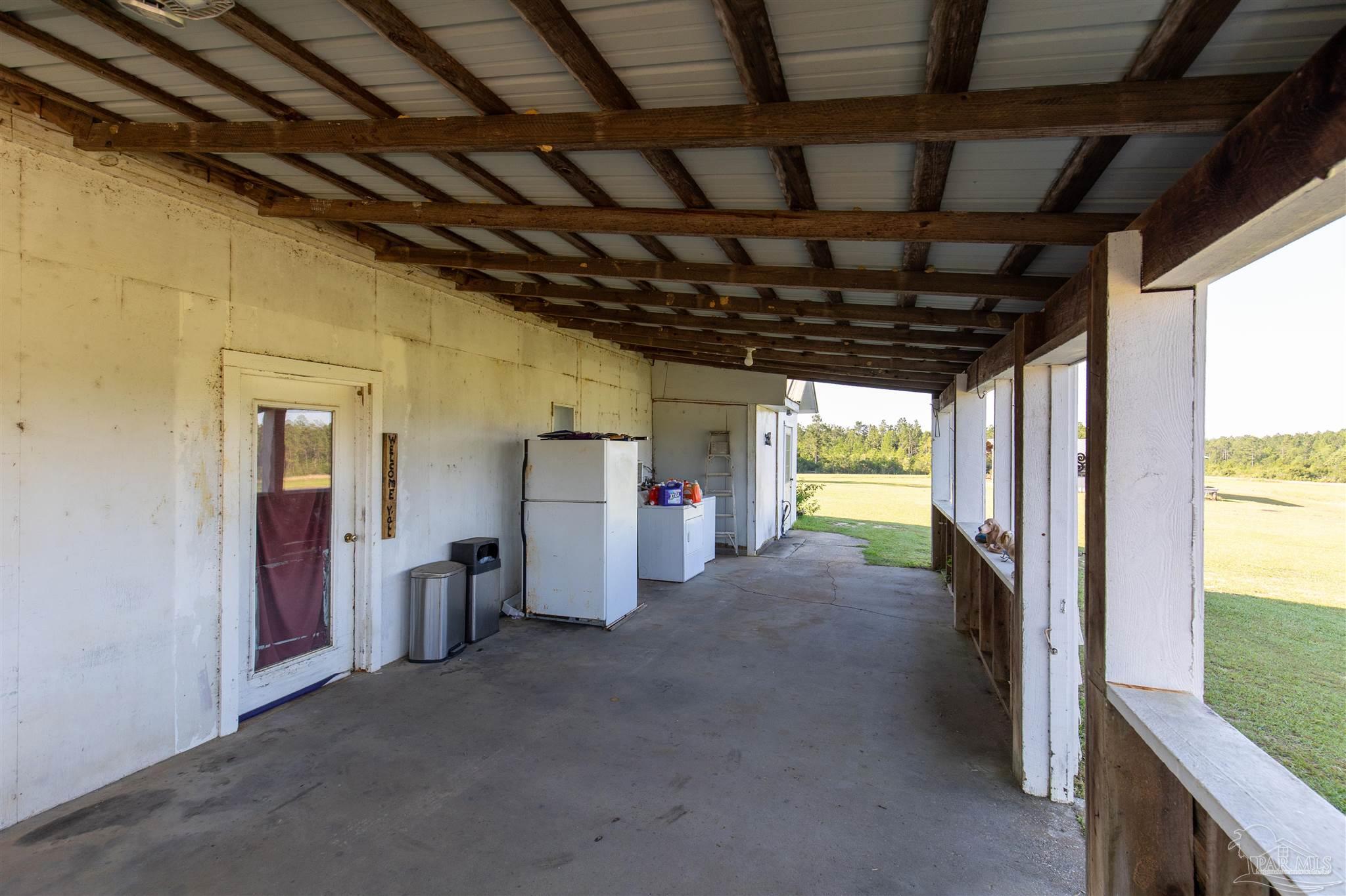 19755 Vaughn Road Seminole, AL 36574 - Photo 8 of 45 a view of empty room with windows
