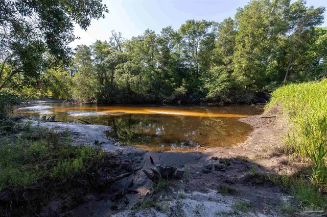a view of a lake with outdoor space