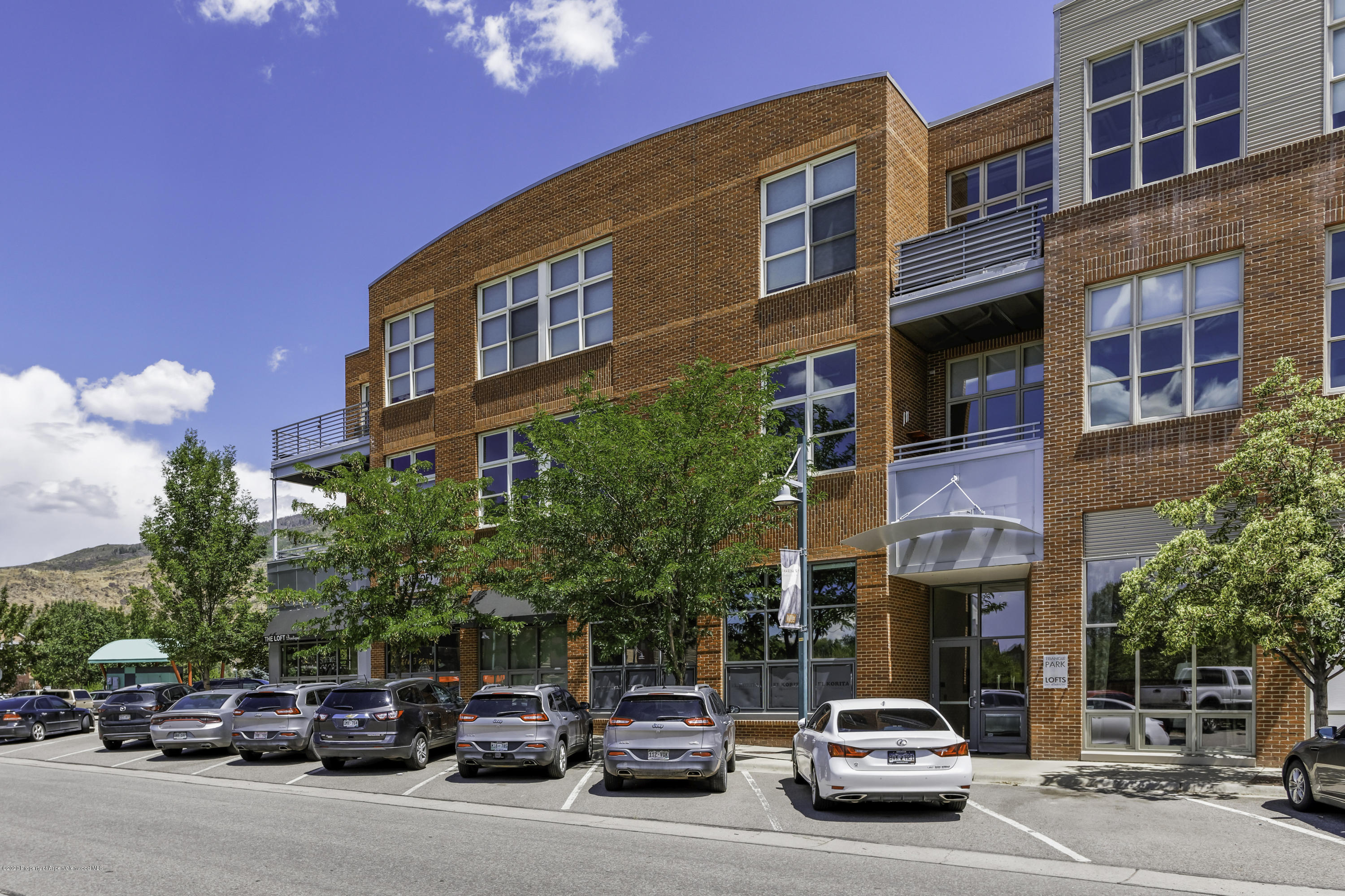 231 Robinson Street, Unit R212 Basalt, CO 81621 - Photo 14 of 14 a car parked in front of a building