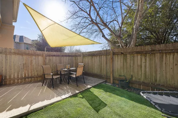 a view of outdoor sitting area with furniture