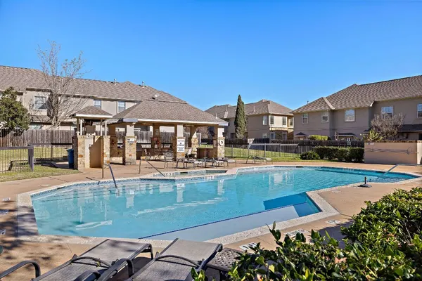a view of a house with swimming pool