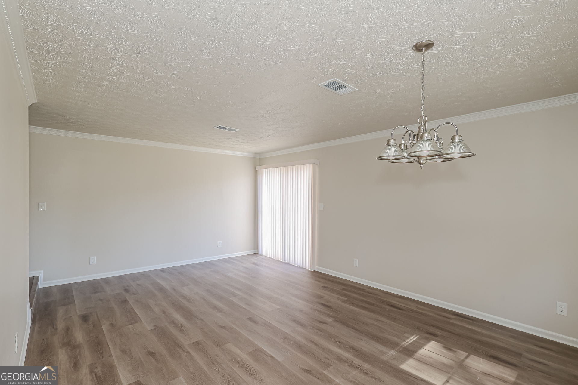295 Adena Lane West South Fulton, GA 30349 - Photo 5 of 16 a view of a room with wooden floor and ceiling fan