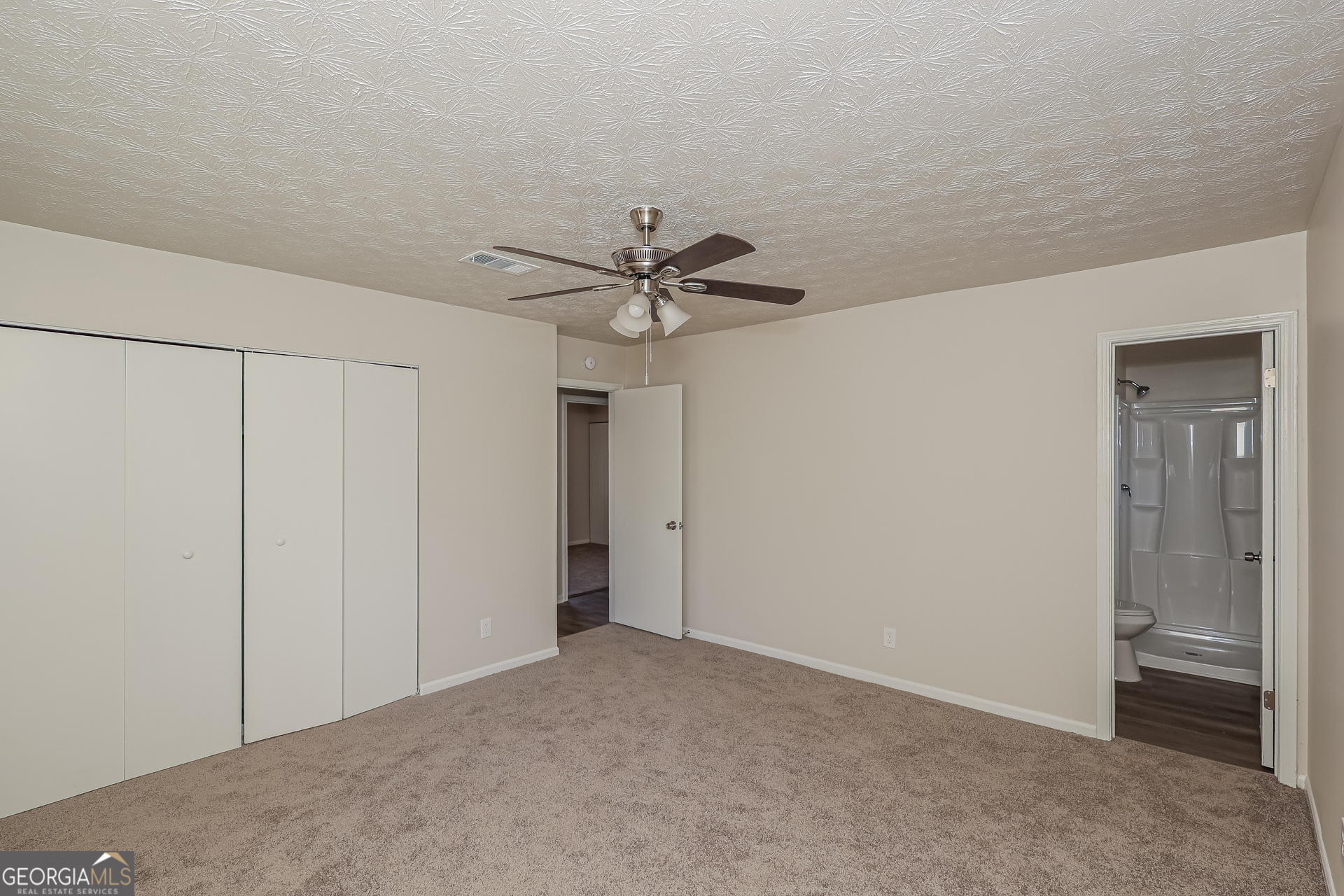295 Adena Lane West South Fulton, GA 30349 - Photo 10 of 16 a view of a livingroom with a ceiling fan