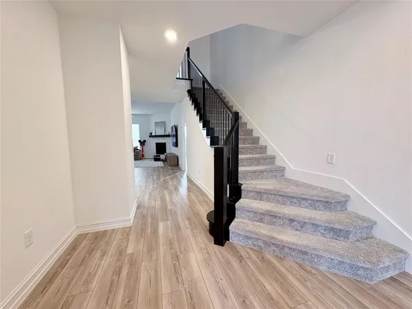 a view of hallway with stairs