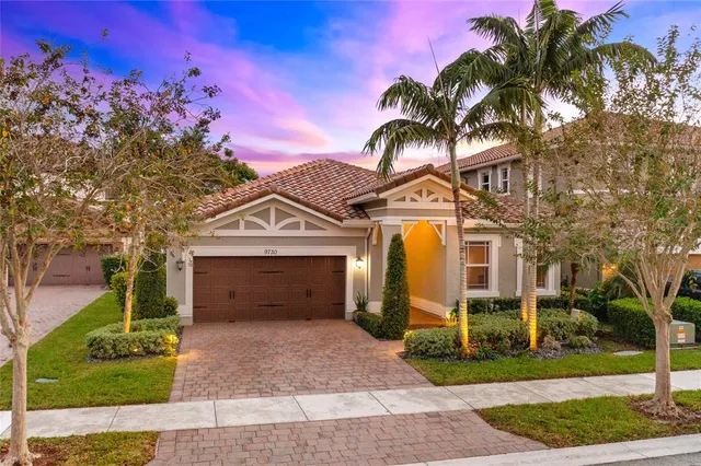 $949,900 | 9730 Blue Isle Bay, Parkland, FL 33076