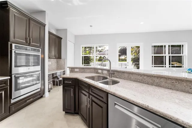 $949,900 | 9730 Blue Isle Bay, Parkland, FL 33076