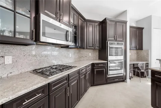 $949,900 | 9730 Blue Isle Bay, Parkland, FL 33076