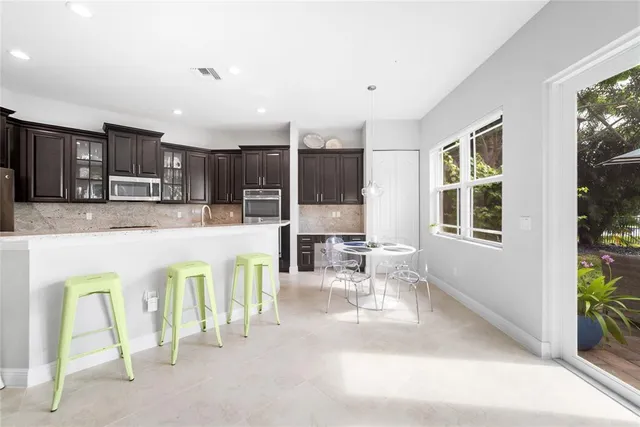 $949,900 | 9730 Blue Isle Bay, Parkland, FL 33076