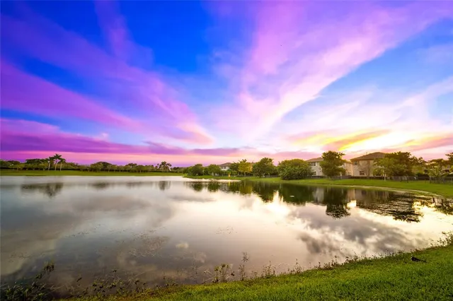 $949,900 | 9730 Blue Isle Bay, Parkland, FL 33076