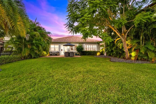 $949,900 | 9730 Blue Isle Bay, Parkland, FL 33076
