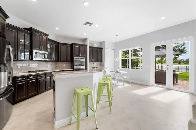 $949,900 | 9730 Blue Isle Bay, Parkland, FL 33076