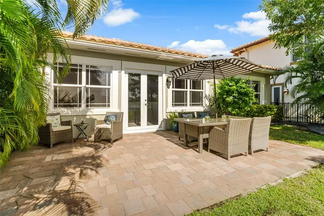 $949,900 | 9730 Blue Isle Bay, Parkland, FL 33076