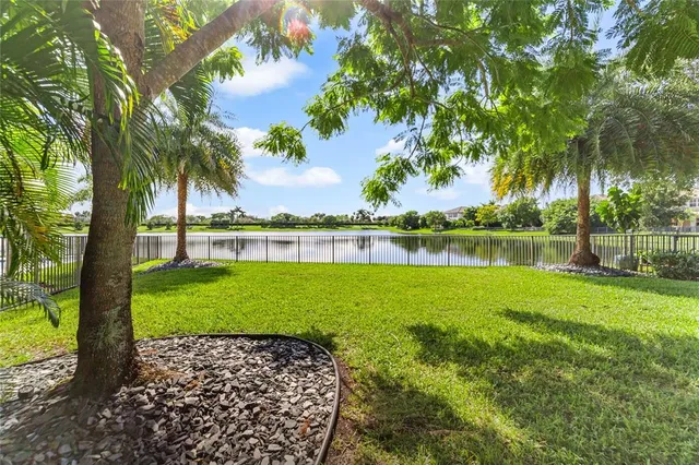$949,900 | 9730 Blue Isle Bay, Parkland, FL 33076